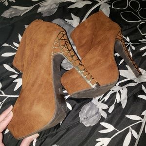 Heeled Booties with heel design.